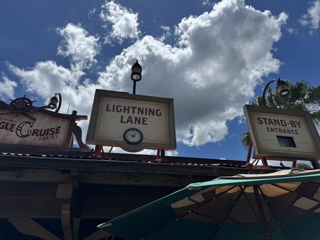 Signs for Lightning Lane and Stand-By Entrance at the Jungle Cruise in Magic Kingdom, with the standby wait listed at 50 minutes.