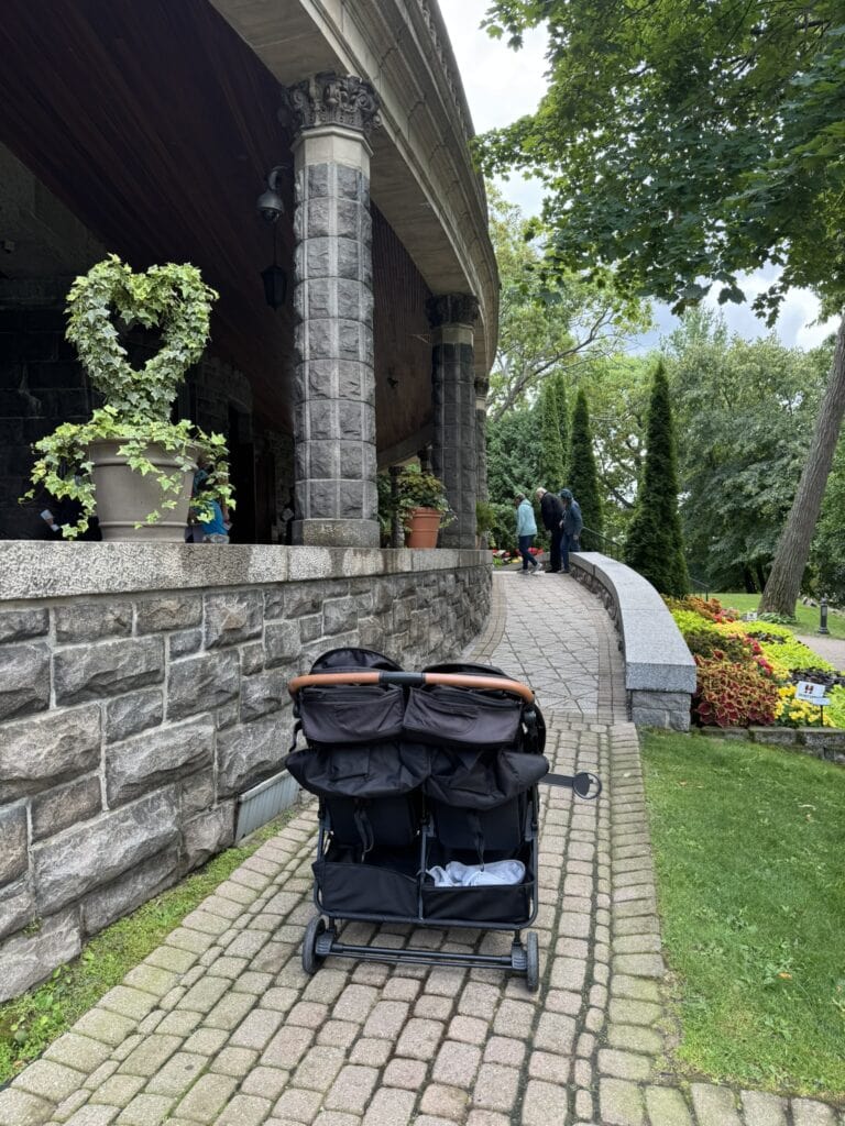 Double stroller parked at the entrance ramp to Boldt Castle in Alexandria Bay With Kids