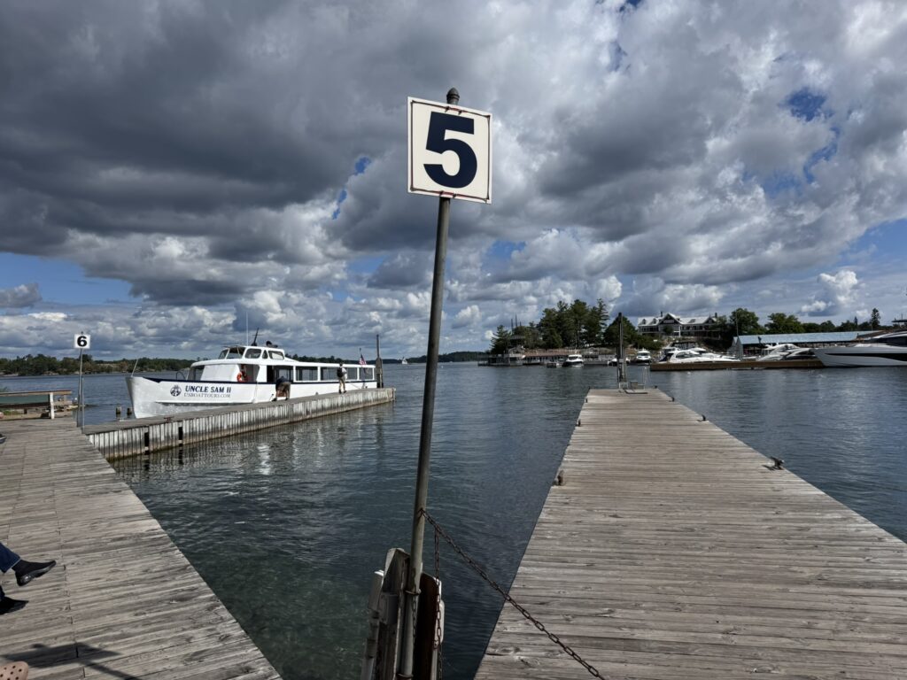 Uncle Sam’s Boat Tours dock in Alexandria Bay With Kids, with tour boat at pier 6