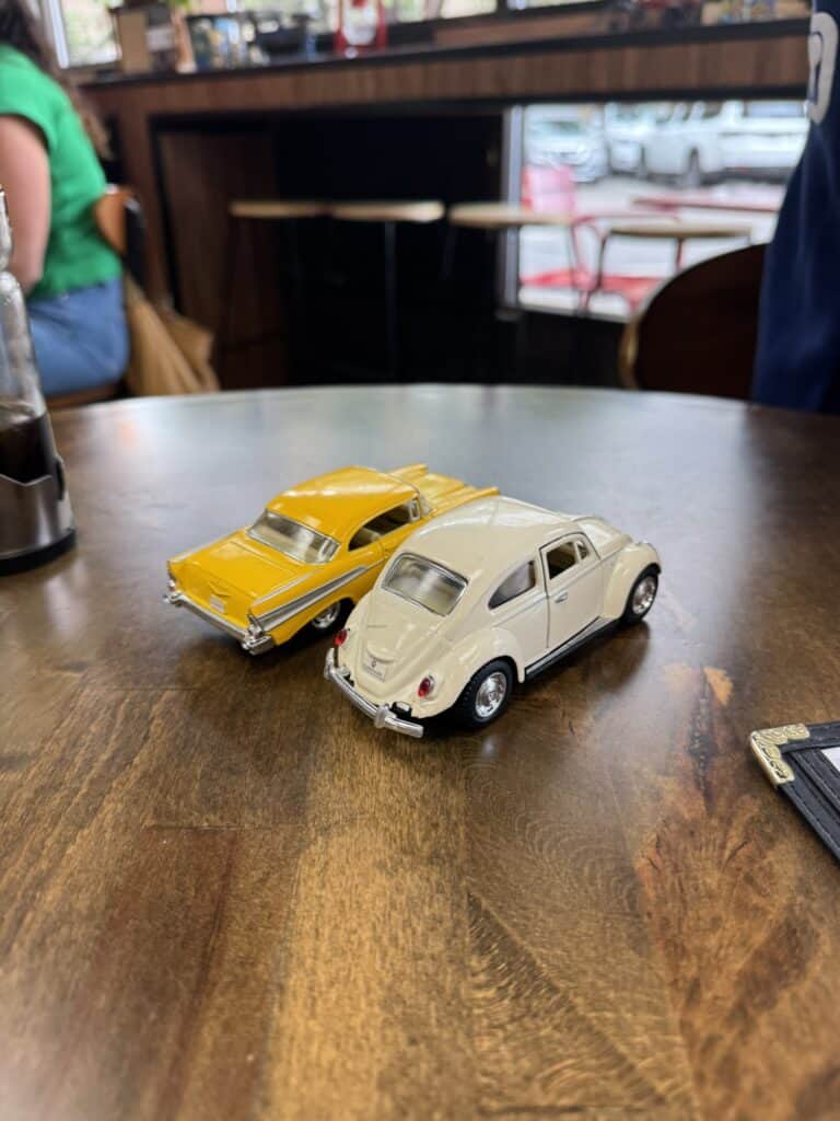 Toy cars on the table at Cuban Corner in Columbia before lunch.